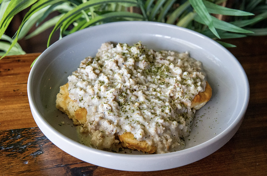 Food + Beer's biscuit and gravy dish ($8) is served with two Southern-style biscuits with homemade sausage gravy.