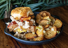 Food + Beer's brunch burger ($11) takes sausage gravy to another level.