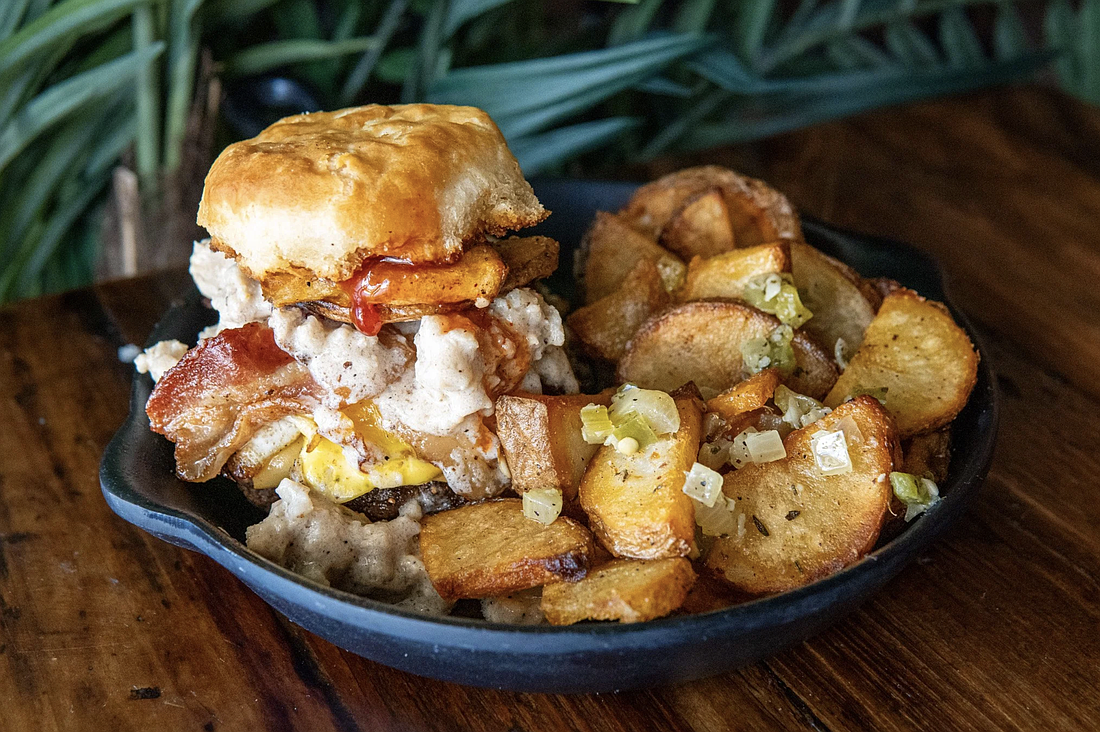 Food + Beer's brunch burger ($11) takes sausage gravy to another level.
