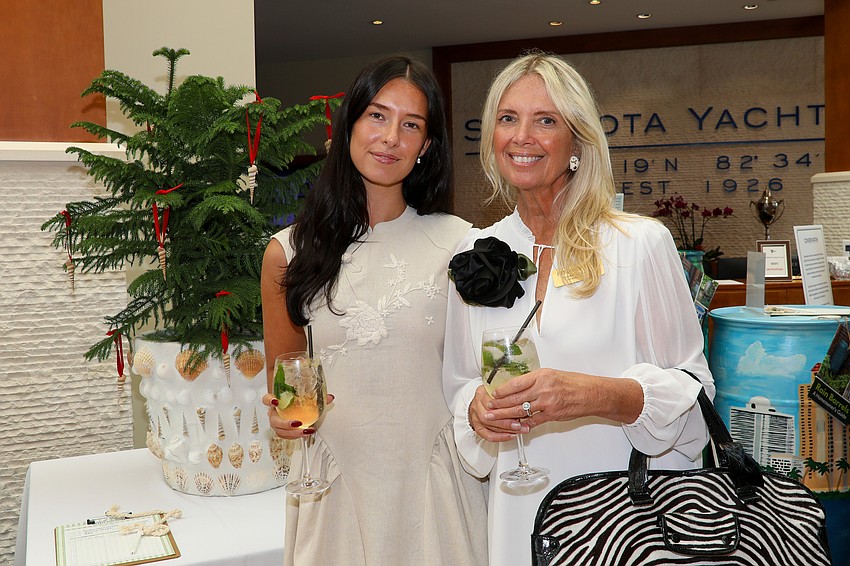 Sophia Hebda and Berncie Hebda enjoy a gardener's shopping experience.