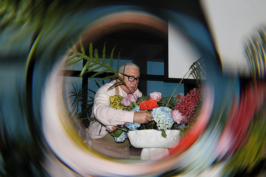 John Grady Burns from Natchez, MS, spoke about floral design and flower arranging at the Founders Garden Club luncheon.