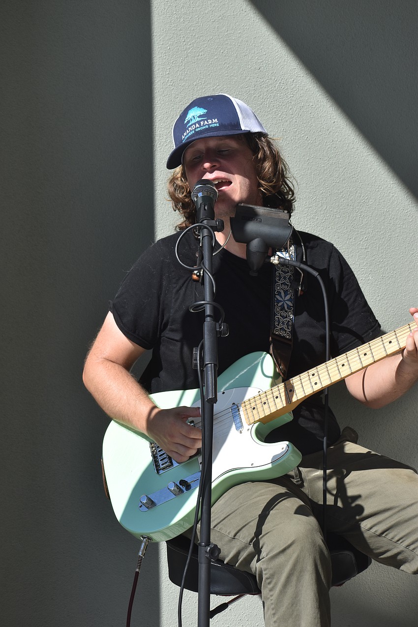 Zack Pomerleau, a one man band based in Bradenton, provided entertainment throughout the event. He performs blues and rock, a combination of originals and covers.