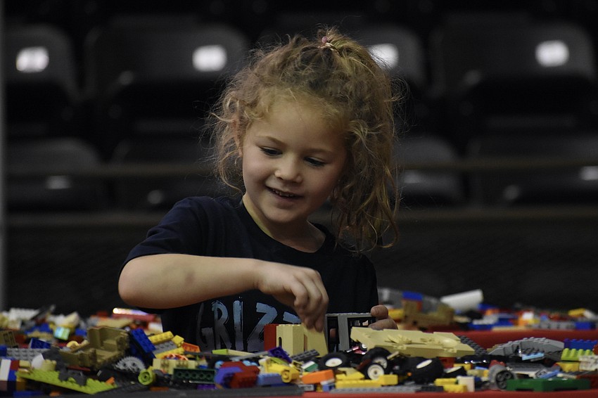 Reese DeLoach, 5, gets creative with the Legos.