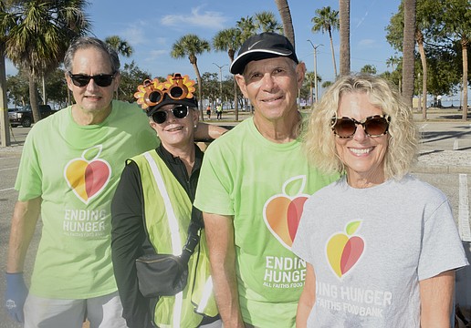 Geoff Levin, Marcy Klein, Steven Goodman and Patricia Courtois volunteer at the Van Wezel.