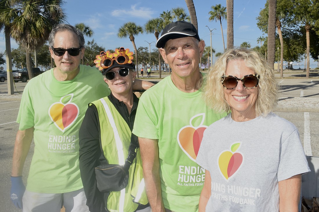 Geoff Levin, Marcy Klein, Steven Goodman and Patricia Courtois volunteer at the Van Wezel.