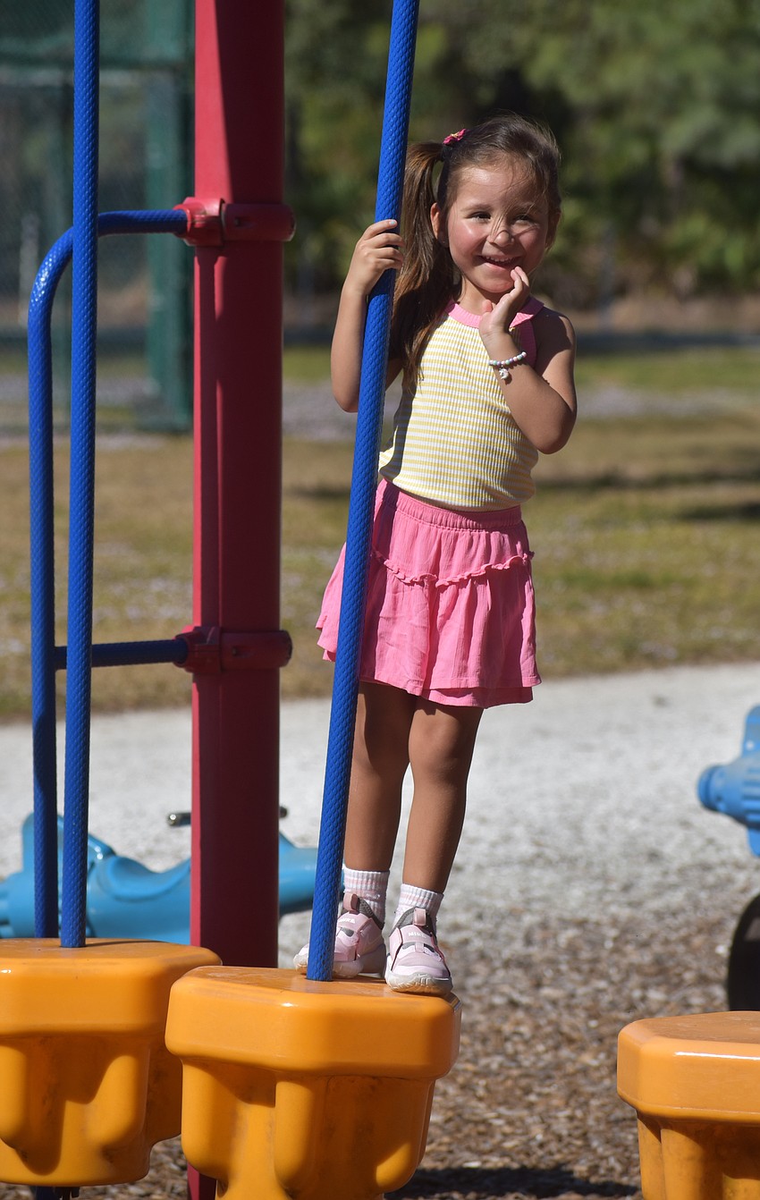 Lakewood Ranch's Ayla Antonina Calmon, 3, just happened to be at Greenbrook Adventure Park for the Party in the Park. Her mother Scheilla said she loves seeing all the happy families together.