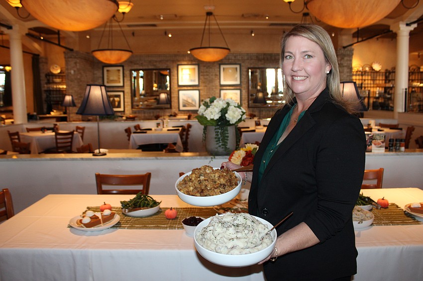 Brio Italian Grille General Manager Jamie Jarrell is ready to serve 900 guests on Thanksgiving at her restaurant at the Mall at UTC.