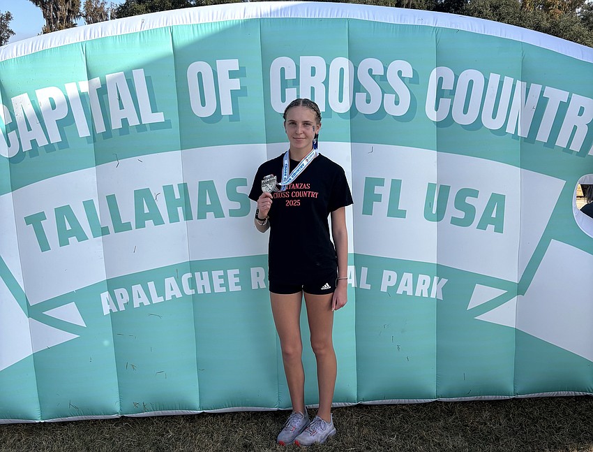 Peyton Cerasi earned an All-State medal with an 11th-place finish in the Class 3A state cross country championship. Courtesy photo Peyton Cerasi earned an All-State medal with an 11th-place finish in the Class 3A state cross country championship. Courtesy photo