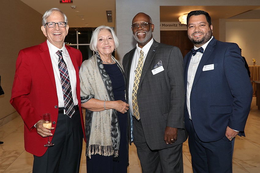 Steve and Marjolaine Townsend with Marvin Austin and Drew Martinez.