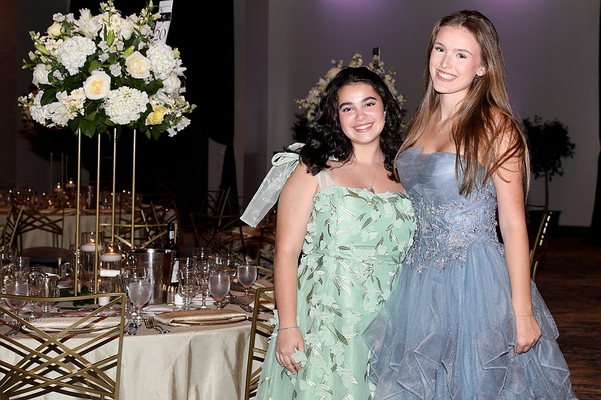 Isabel J. and Juliette P. get ready to perform on stage.