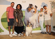 Serge and Sonia Gauthier, owners of Gauthier Salon & Wellness Center, commissioned artist Ludmil Iliev, joined by Vladi Iliev, to paint a mural inspired by shop greeter Ziggy the dog.