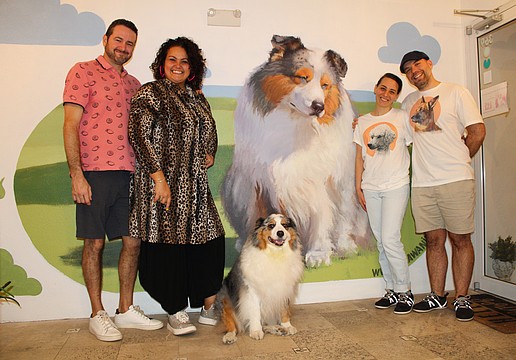 Serge and Sonia Gauthier, owners of Gauthier Salon & Wellness Center, commissioned artist Ludmil Iliev, joined by Vladi Iliev, to paint a mural inspired by shop greeter Ziggy the dog.
