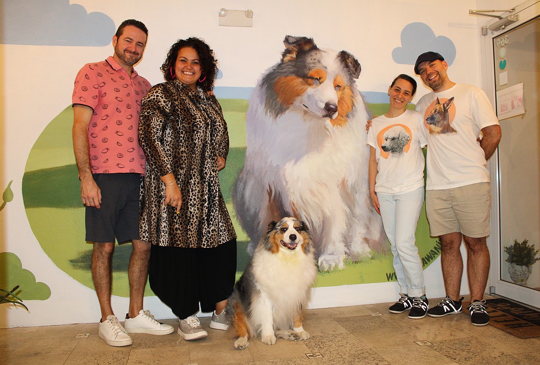 Serge and Sonia Gauthier, owners of Gauthier Salon & Wellness Center, commissioned artist Ludmil Iliev, joined by Vladi Iliev, to paint a mural inspired by shop greeter Ziggy the dog.
