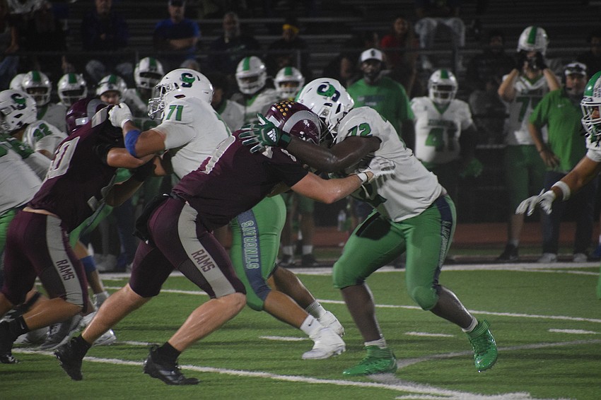 Playing at defensive end, Miles Przekwas tussles with Sumner offensive lineman George Selvie. On Sept. 24, Przekwas received his first NCAA Division I offer from Eastern Kentucky, an FCS program in the United Athletic Conference.