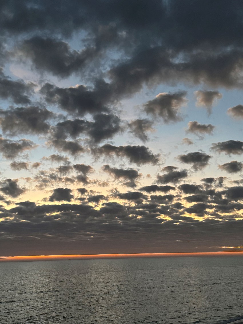 Donna Jablonski took this photo of these cotton ball shaped clouds over Longboat Key.