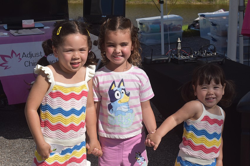 Gloria Fugleberg, Dela Reynolds and Cambria Fugleberg check out the different booths at the Market at Nathan Benderson Park alongside their moms Jordan Reynolds and Suji Fugleberg.