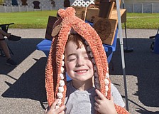 Siesta Key's Owen Slater, 5, loves animals and couldn't leave the market without getting a homemade octopus from Stitch Fabels, which took 10 hours to make.