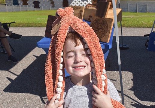Siesta Key's Owen Slater, 5, loves animals and couldn't leave the market without getting a homemade octopus from Stitch Fabels, which took 10 hours to make.
