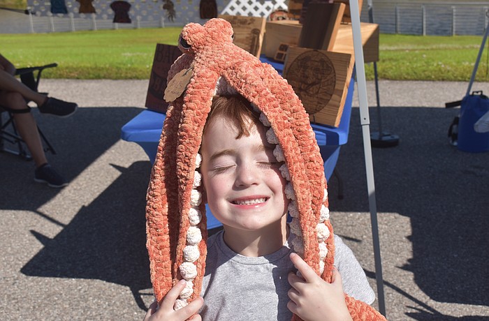 Siesta Key's Owen Slater, 5, loves animals and couldn't leave the market without getting a homemade octopus from Stitch Fabels, which took 10 hours to make.