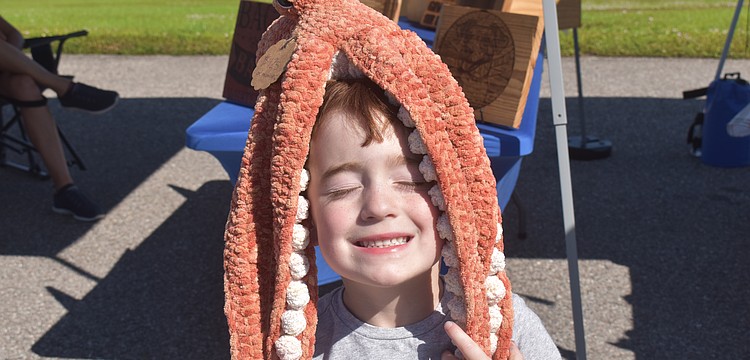Siesta Key's Owen Slater, 5, loves animals and couldn't leave the market without getting a homemade octopus from Stitch Fabels, which took 10 hours to make.