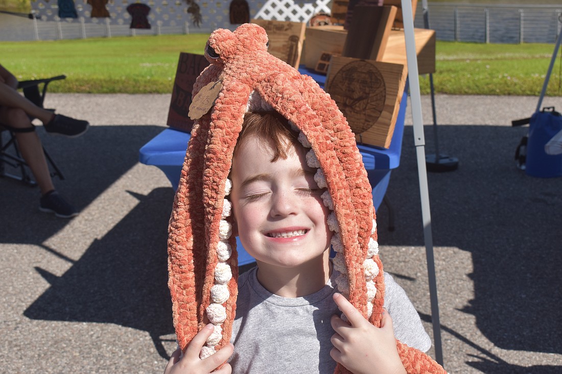 Siesta Key's Owen Slater, 5, loves animals and couldn't leave the market without getting a homemade octopus from Stitch Fabels, which took 10 hours to make.