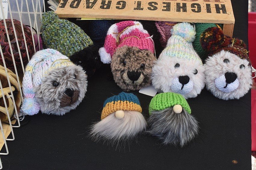 Myakka City's Rhonda Wright of Rhonda's Alpaca Treasures & Artistic Creations made homemade bear head ornaments for the Market at Nathan Benderson Park. She knits the head, stuffs it, embroiders the face, sews the eyes on and knits the hat.