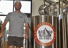 CEO Mike Bisaha says the new equipment will at least triple Big Top Brewing Co.'s beer production.