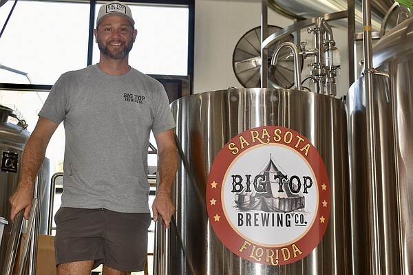CEO Mike Bisaha says the new equipment will at least triple Big Top Brewing Co.'s beer production.