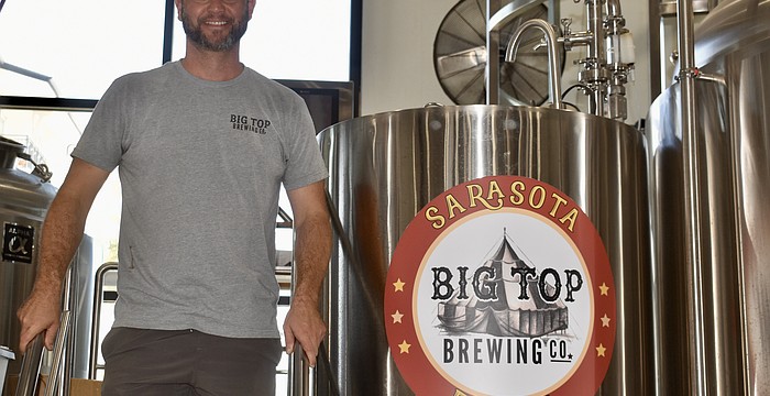 CEO Mike Bisaha says the new equipment will at least triple Big Top Brewing Co.'s beer production.