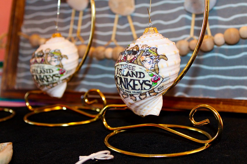 Artist Janet Peavy painted a variety of ornaments for her debut at Three Island Monkeys.
