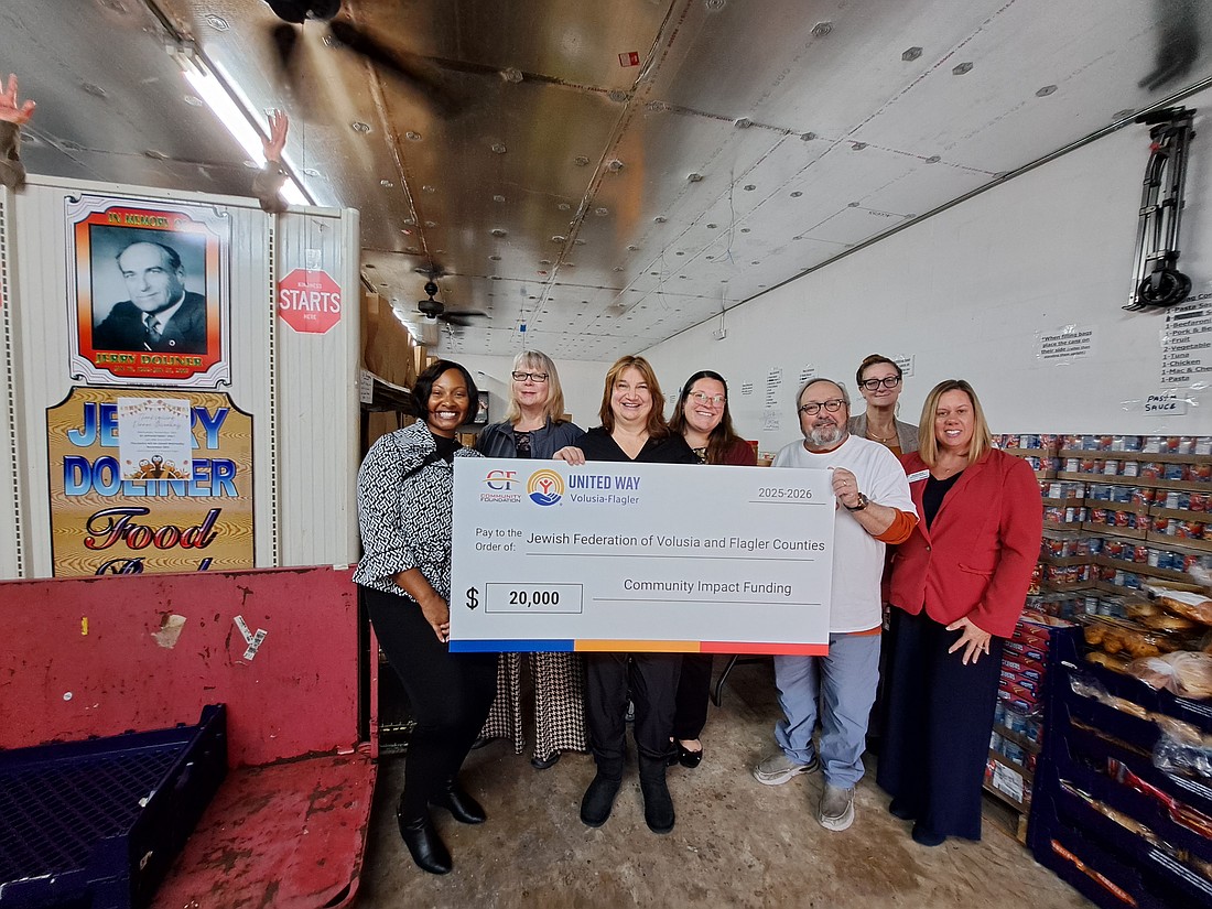 Leah R.H. Robinson, Marketing & Communications Senior Manager, CF/UWVFC; Denise O’Toole Kelly, Community Investments Assistant Director, CF/UWVFC; Amy Rugg, Community Impact Committee Member, CF/UWVFC; Courtney Edgcomb, President & CEO, CF/UWVFC;  Rabbi Rob Lennick, Executive Director, Jewish Federation of Volusia & Flagler Counties; Rosana Colev, VITA Coordinator, CF/UWVFC; and Amanda Lasecki, VP of Operations, CF/UWVFC. Courtesy photo