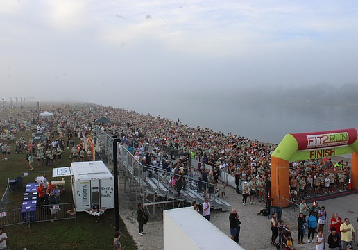Runners pack the starting area for the 2025 Florida Turkey Trot Nov. 27 at foggy Nathan Benderson Park. The race had a record 4,558 participants.