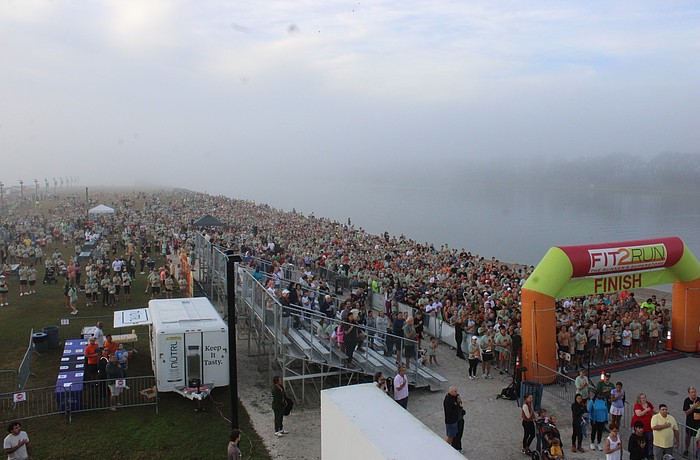 Runners pack the starting area for the 2025 Florida Turkey Trot Nov. 27 at foggy Nathan Benderson Park. The race had a record 4,558 participants.