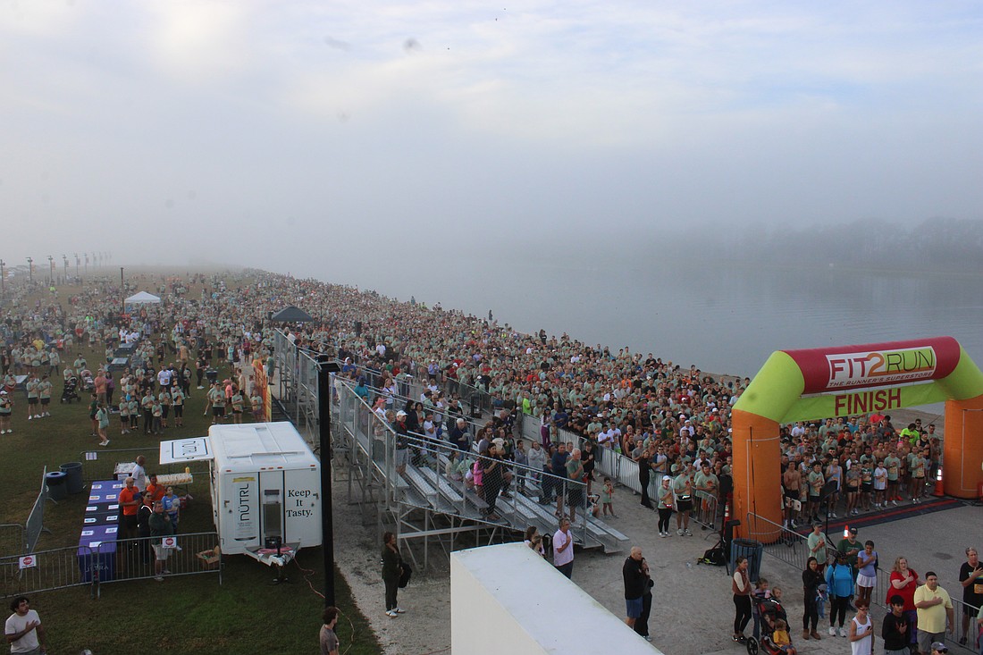 Runners pack the starting area for the 2025 Florida Turkey Trot Nov. 27 at foggy Nathan Benderson Park. The race had a record 4,558 participants.