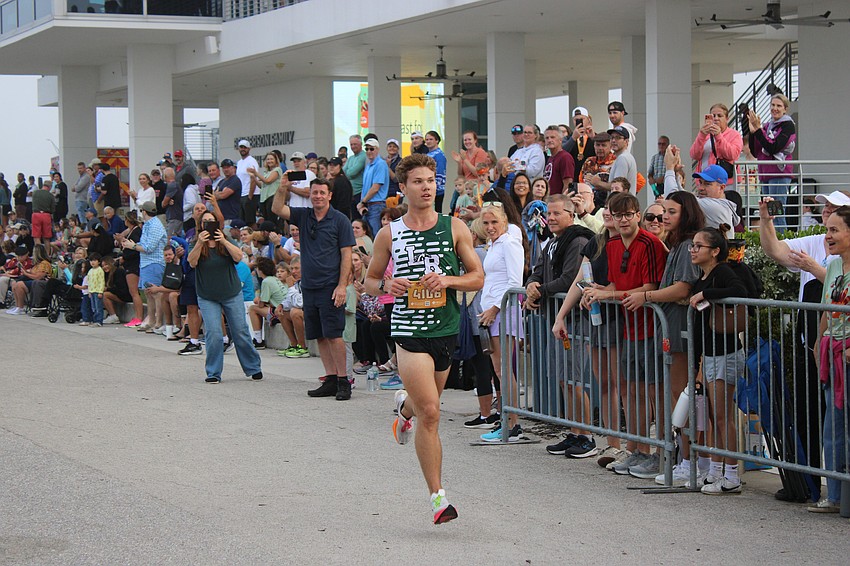 Derek Robinson, a 2025 Lakewood Ranch High graduate, cruises to victory in the Florida Turkey Trot at Nathan Benderson Park Nov. 27. Robinson, who finished in 16:37.45, now attends Southeastern University.