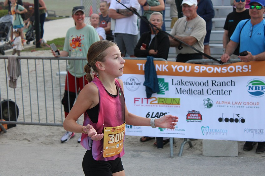 Eleven-year-old Sterling Howard of Fishers, Indiana, was the overall women's champ of the 2025 Florida Turkey Trot at Nathan Benderson Park. She finished in 18:13.82.