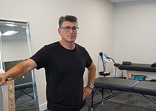 Petar Sibinkic is the owner and a trainer at Longboat Key Fitness, which is expanding to the unit next door, with the new space focused on stretching and massaging.