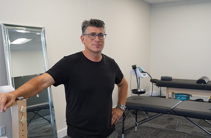 Petar Sibinkic is the owner and a trainer at Longboat Key Fitness, which is expanding to the unit next door, with the new space focused on stretching and massaging.