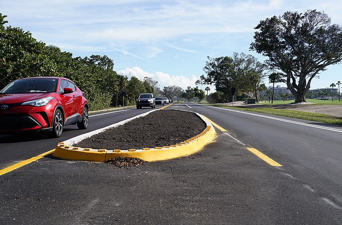 The Country Club Shores turn lane project on Gulf of Mexico Drive nears completion Wednesday, Nov. 26, 2025, with landscaping and some striping remaining.