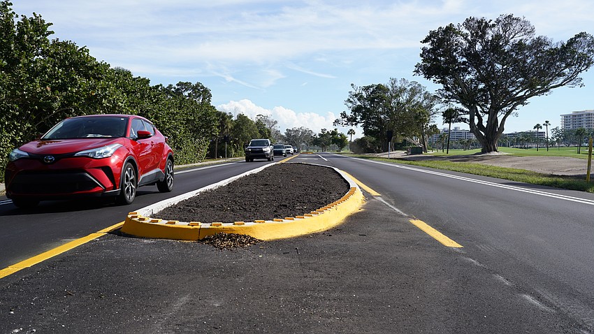 The Country Club Shores turn lane project on Gulf of Mexico Drive nears completion Wednesday, Nov. 26, 2025, with landscaping and some striping remaining.