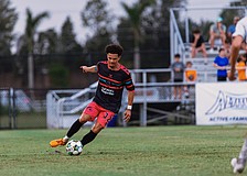 Roberto Burlew dribbles down the turf at Premier Sports Campus in Lakewood Ranch. The Sarasota Paradise signed the defender to their roster ahead of the team's first professional season in USL League One.