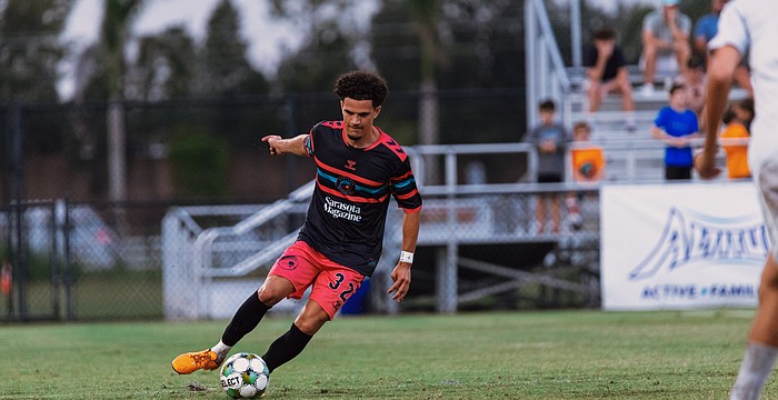 Roberto Burlew dribbles down the turf at Premier Sports Campus in Lakewood Ranch. The Sarasota Paradise signed the defender to their roster ahead of the team's first professional season in USL League One.