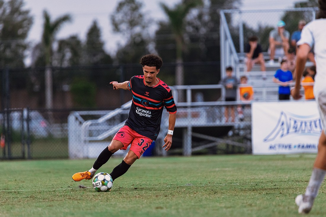 Roberto Burlew dribbles down the turf at Premier Sports Campus in Lakewood Ranch. The Sarasota Paradise signed the defender to their roster ahead of the team's first professional season in USL League One.