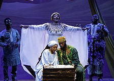 Stephanie Zandra plays the Archangel who looks down over Joseph (Eustace Williams) and Mary (Maicy Powell) in Westcoast Black Theatre Troupe's "Black Nativity," which runs through Dec. 21.