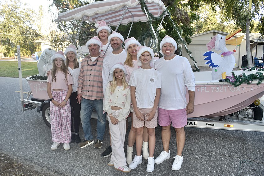 Hosting Santa Claus were Addison Dooley, 11, Chelsea Dooley, David Janes, Sally Janes, John Dooley, Sailor Fleming, 11, Jordan Fleming, Sawyer Fleming, 12, and Eric Fleming, founder of the law offices of Eric C. Fleming.