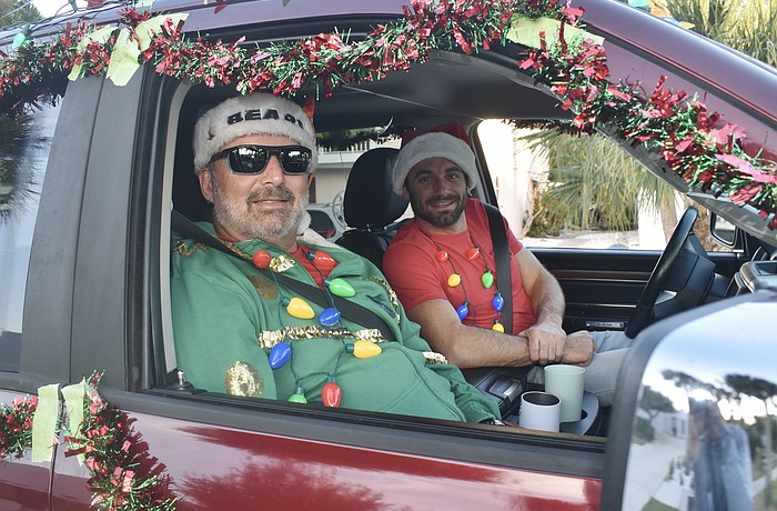 Siesta Key Oyster Bar co-founder Geno Pedigo, and Zach Steffen, prepare to ride out.