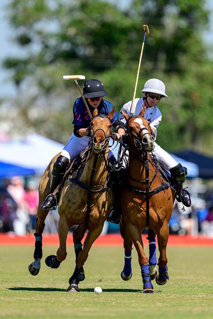 Neck-and-neck on the field at Sarasota Polo Club, Olivia Uchiritz (left) and Kylie Sheehan (right) chase the ball.