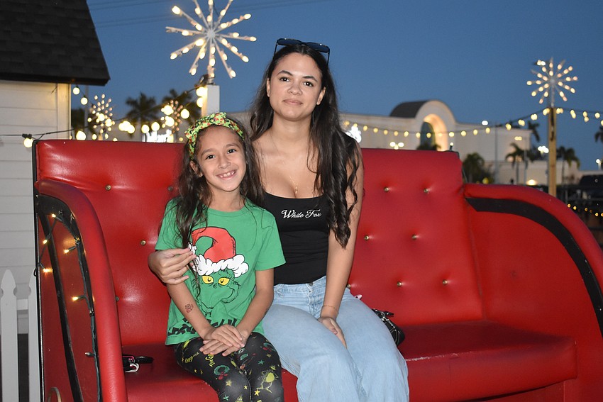 Wimauma's 8-year-old Isabella Rice and 18-year-old Syriana Noake have visited UTC during the holidays before, but this is the first year that they're taking a horse-drawn carriage ride.