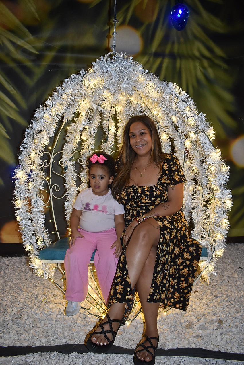 New York's 3-year-old Luz is at UTC with her mom Nayda Morales. They're visiting friends in Tampa.