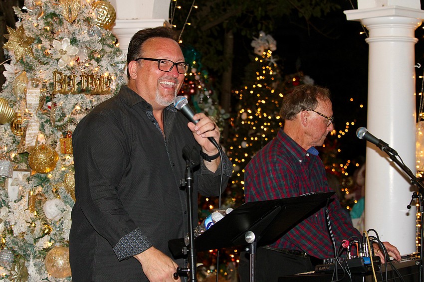 Greg Anderson and Steve Quinn bring their musical talent to the opening night of Christmas in the Garden on Nov. 30 at Longboat Island Chapel.